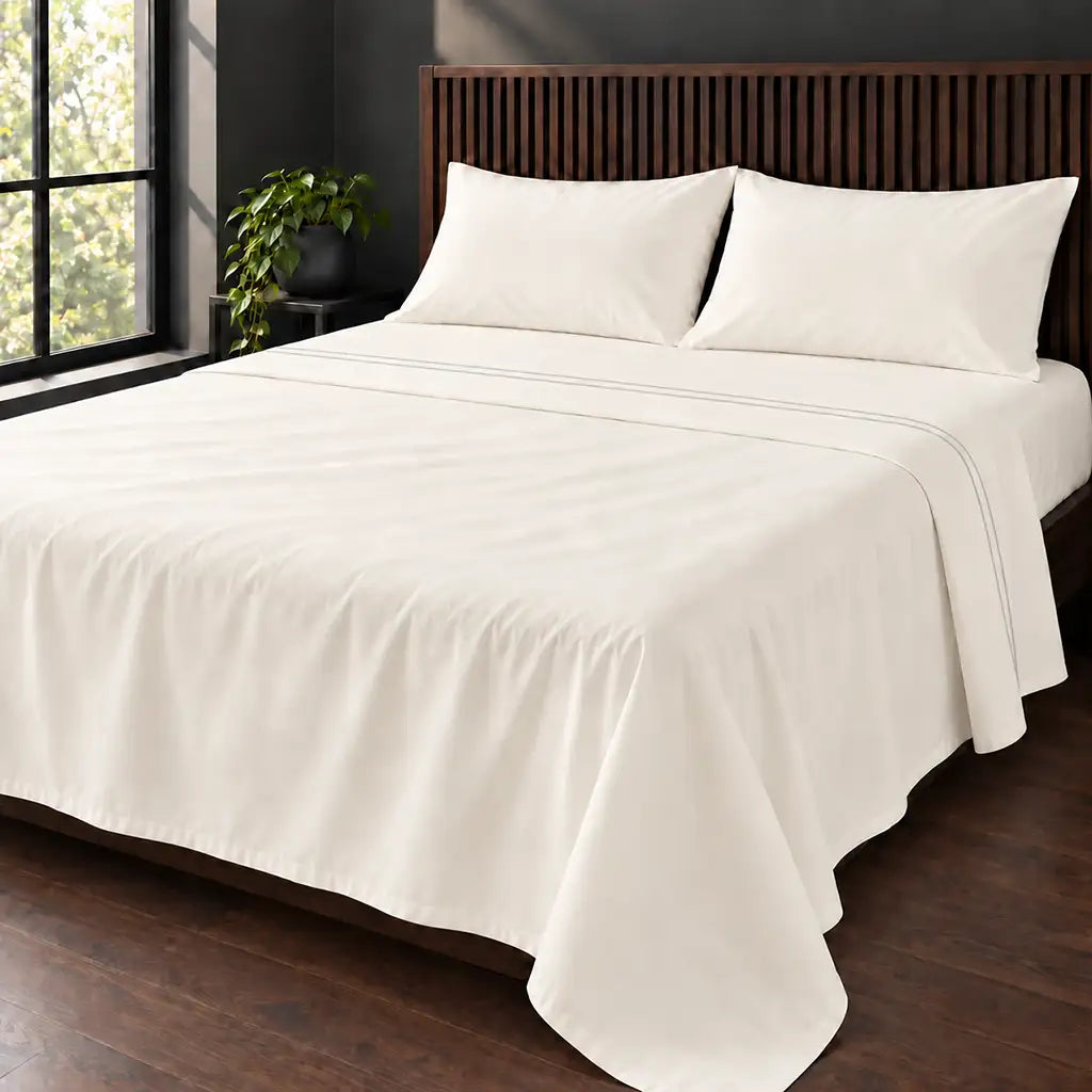 cream cotton percale 200tc flat sheet, two row grey satin stitch — hero — Linen and Co