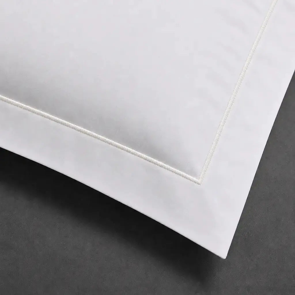 White 100% cotton percale 200TC Oxford pillow case, Standard and King, natural cream one-row satin stitch — close-up detail.