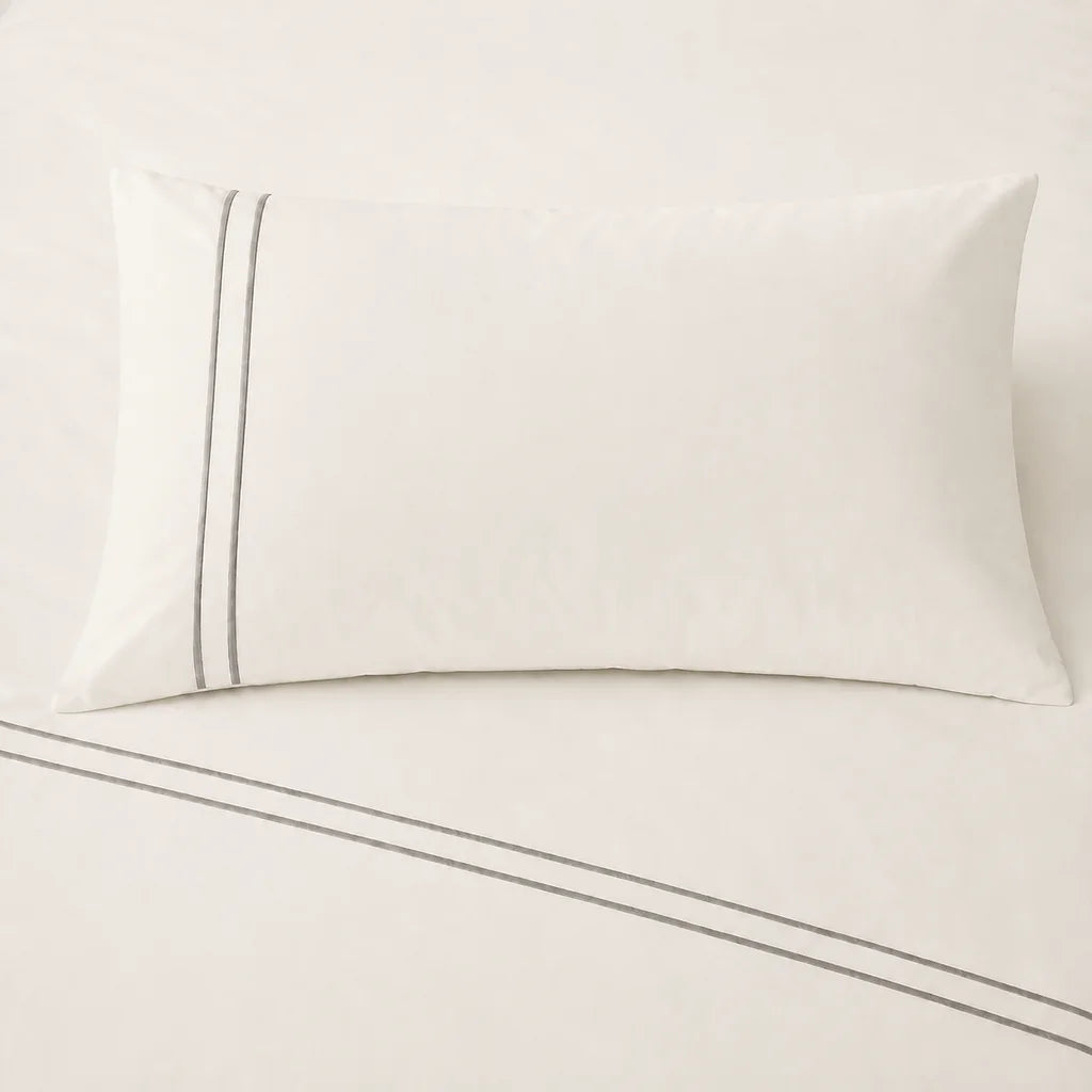 Cream 200TC cotton percale plain duvet cover set with Stone two row satin stitch - on the bed - Linen and Co