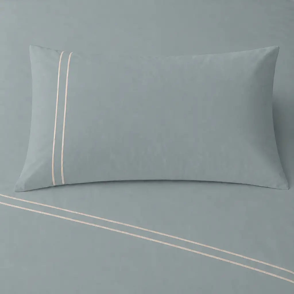 Duck Egg 200TC cotton percale plain duvet cover set with Stone two row satin stitch - pillow on bed - Linen and Co