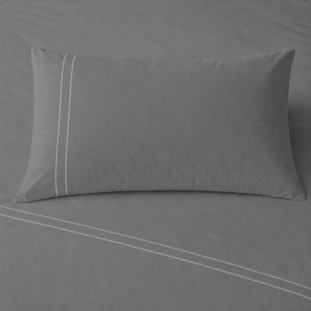 Grey 200TC cotton percale plain duvet cover set with Grey two row satin stitch - pillow on bed - Linen and Co