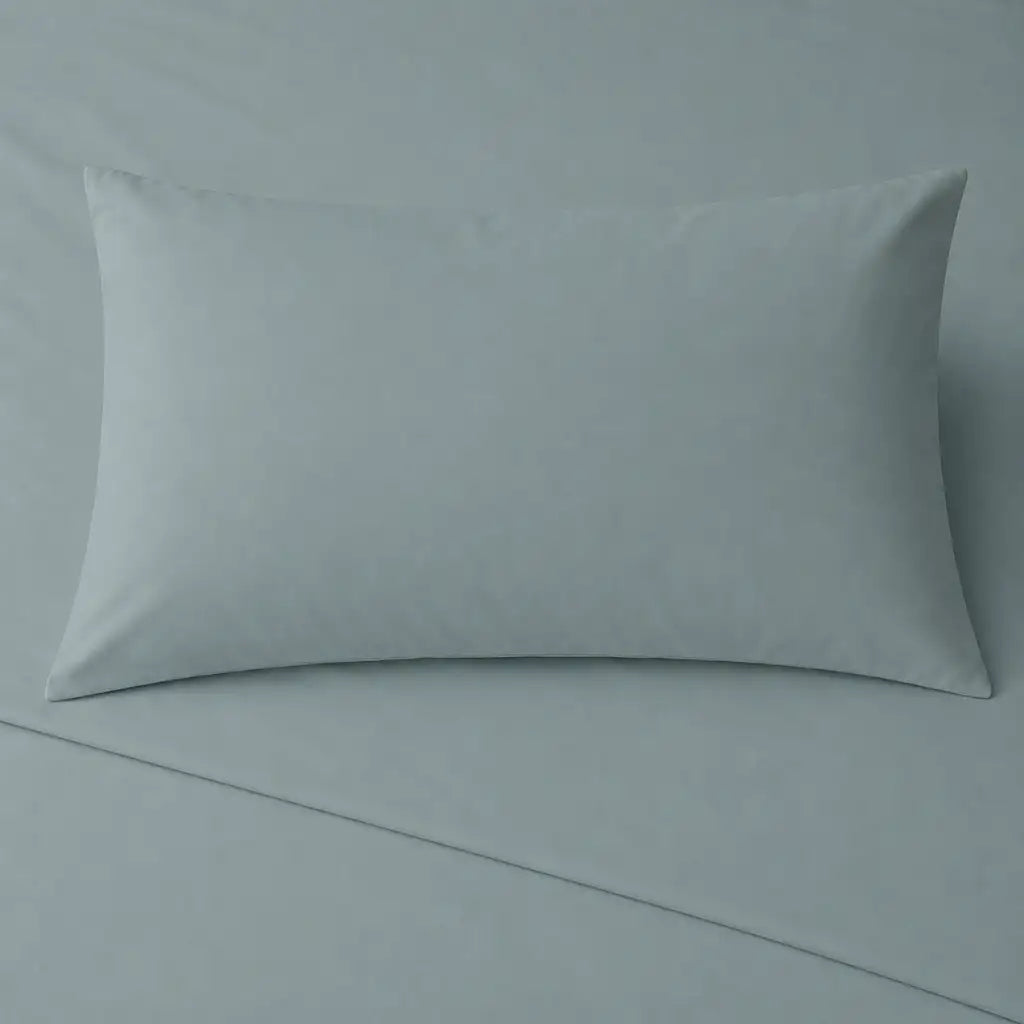 Duck Egg 200TC cotton percale plain duvet cover set with no satin stitch - pillow on bed - Linen and Co