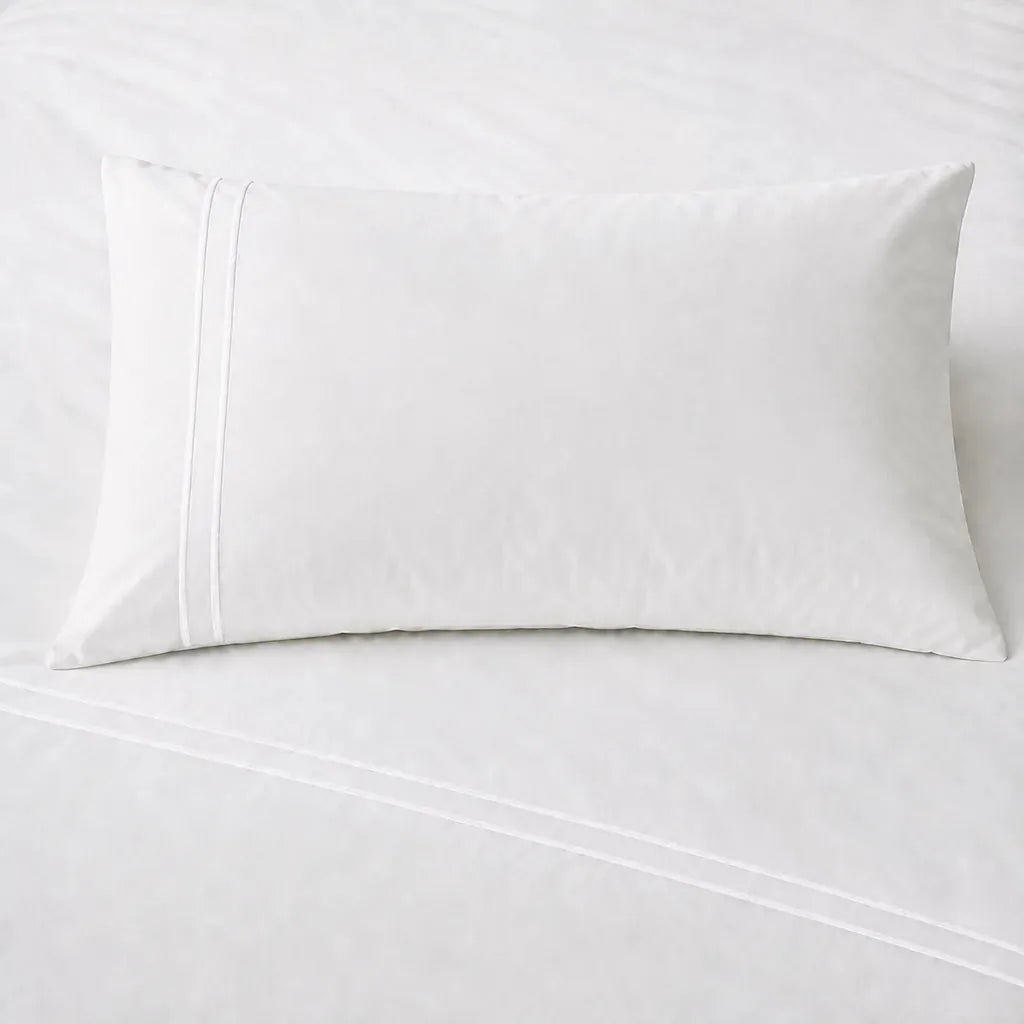 White 200TC plain duvet cover with White two row satin stitch - on the bed - Linen and Co