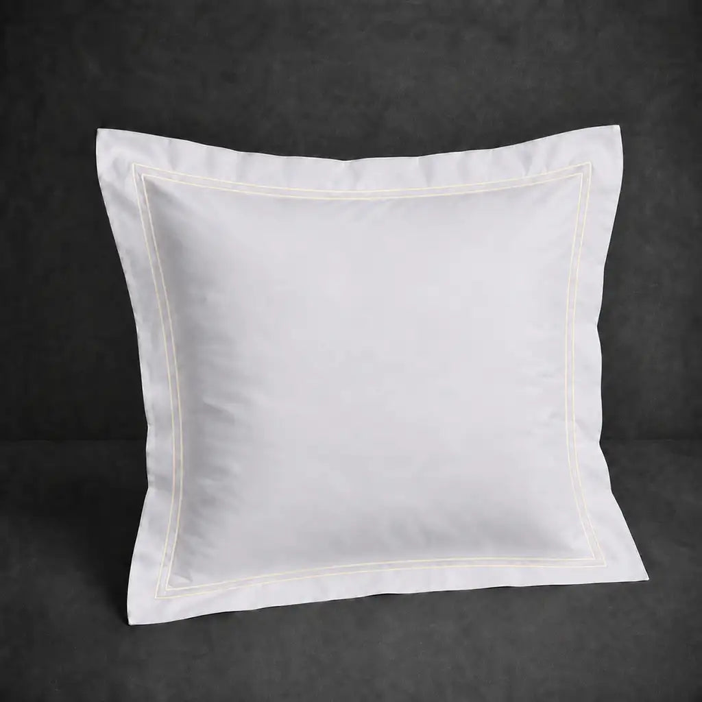 White 100% cotton percale 300TC Oxford pillow case, Continental, natural cream two-row satin stitch — front view.