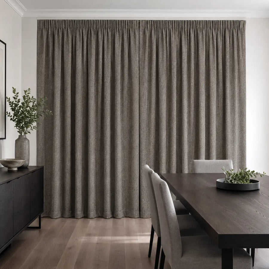 Coffee blockout curtains ground a refined dining room with rich colour and practical privacy.
