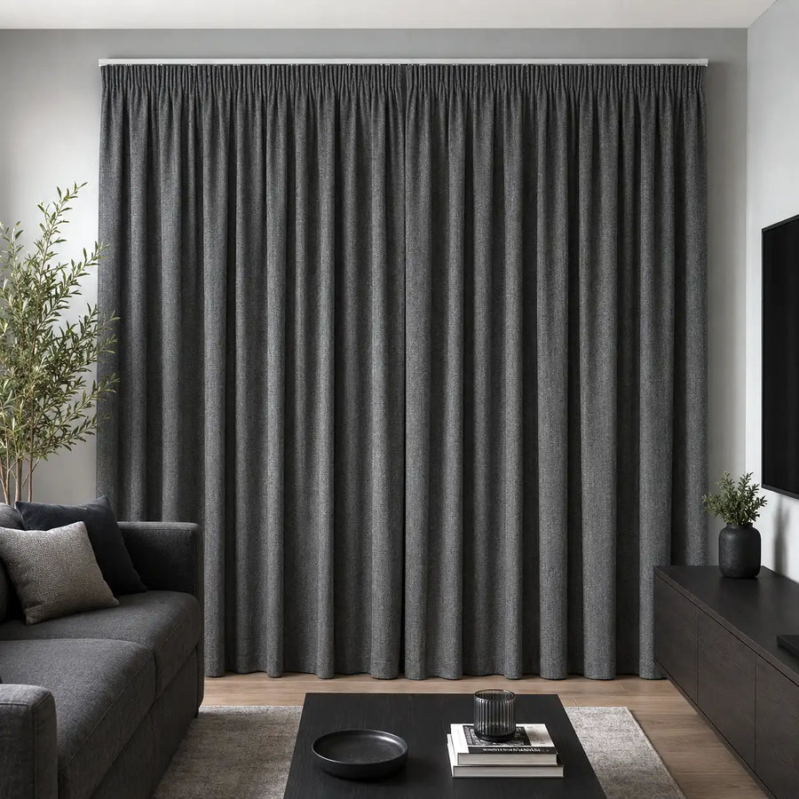 Storm blockout curtains add depth, light control and a polished finish to a modern living room.