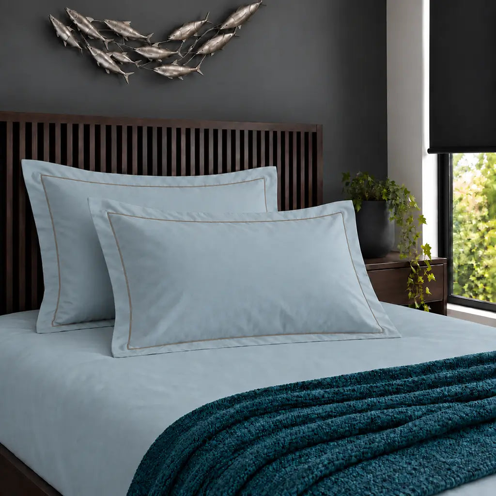 Oxford duck egg 200TC cotton percale pillowcases with one row stone satin stitch border by Linen and Co