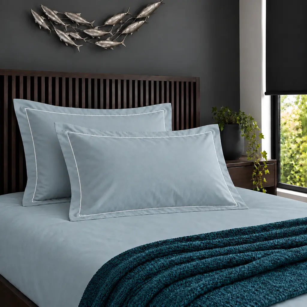 Oxford duck egg 200TC cotton percale pillowcases with one row white satin stitch border by Linen and Co