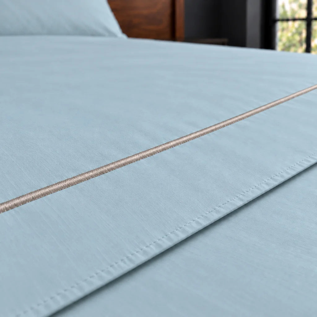 duck egg polycotton percale 200tc flat sheet, one row stone satin stitch — close up — Linen and Co