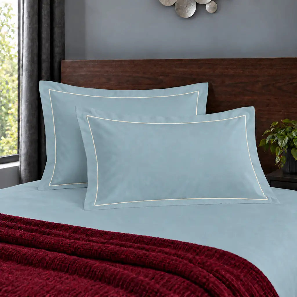 Oxford duck egg 200TC polycotton percale pillowcases with one row cream satin stitch border by Linen and Co