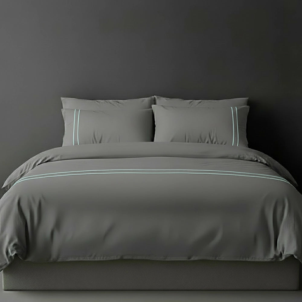 Grey duvet cover with duck egg satin stitch and pillows by Linen and Co - luxury bed linen
