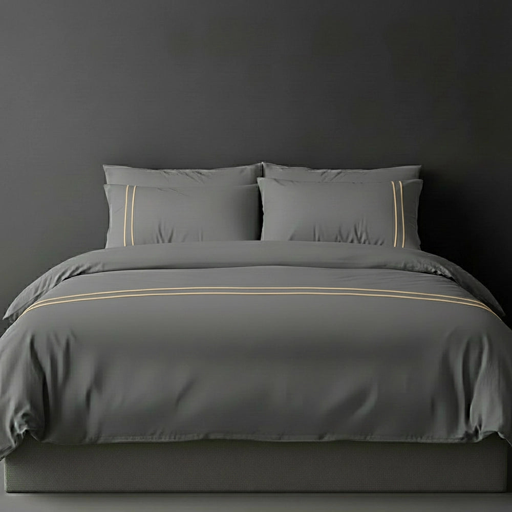 Grey duvet cover with stone satin stitch and pillows by Linen and Co - luxury bed linen