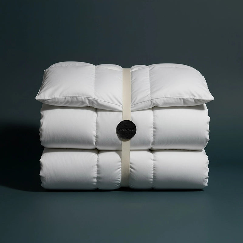 Premium white duvet inners by Linen and Co - luxury hospitality bed linen with product branding