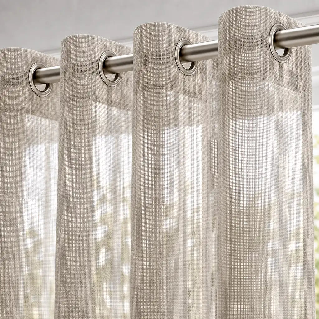 Ella Sand sheer eyelet curtain close-up with silver eyelets