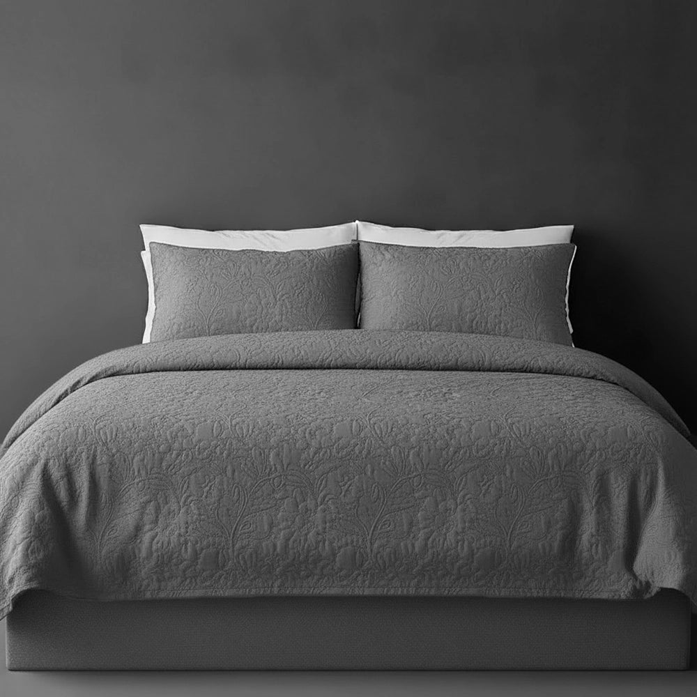Grey Carmen bedspread on bed by Linen and Co - luxury hospitality bedspread with textured finish