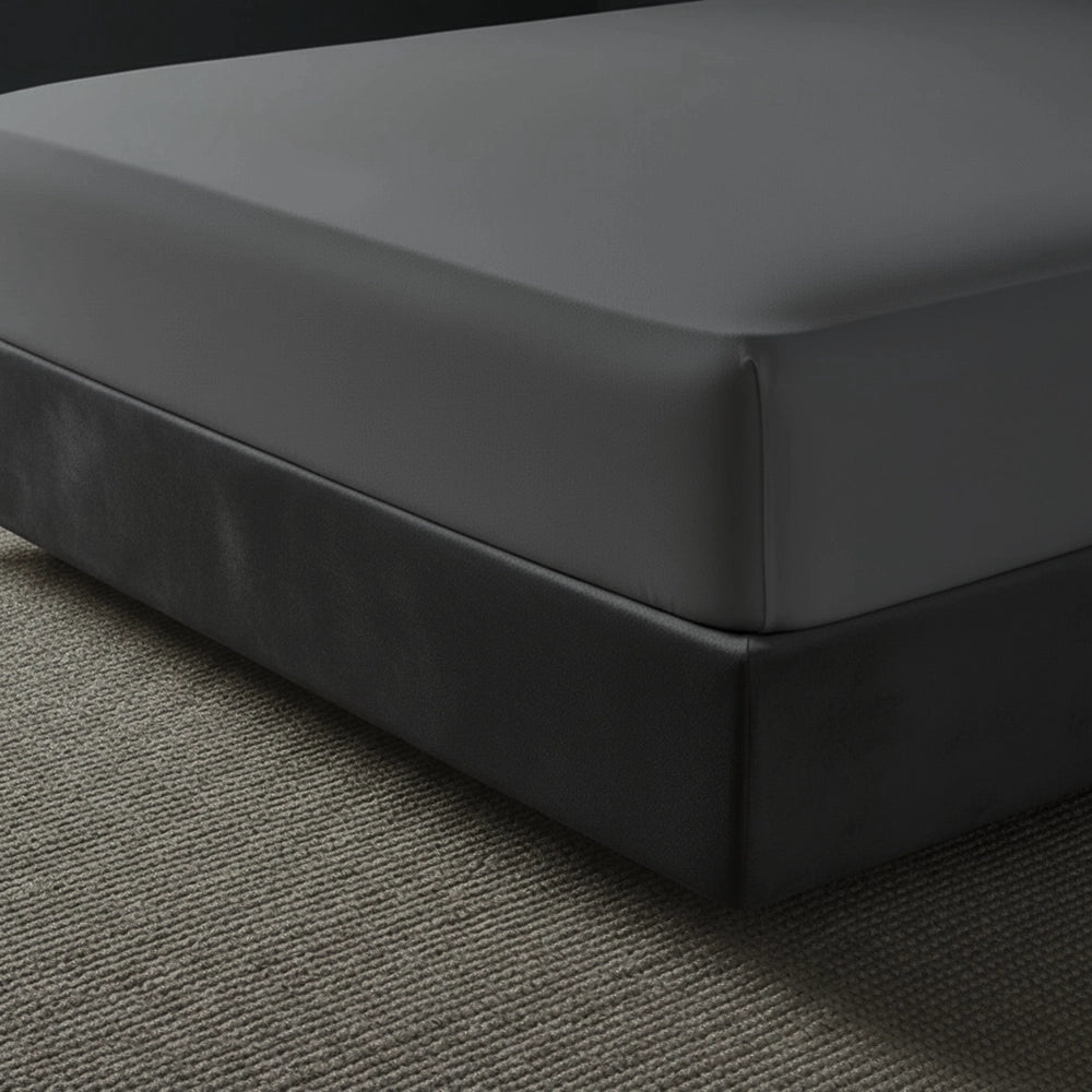 Grey fitted sheet on grey bed frame by Linen and Co - premium hospitality bed linen