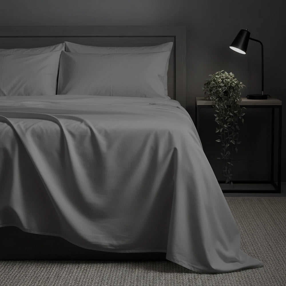 Grey flat sheet in hotel setting by Linen and Co - premium hospitality bed linen