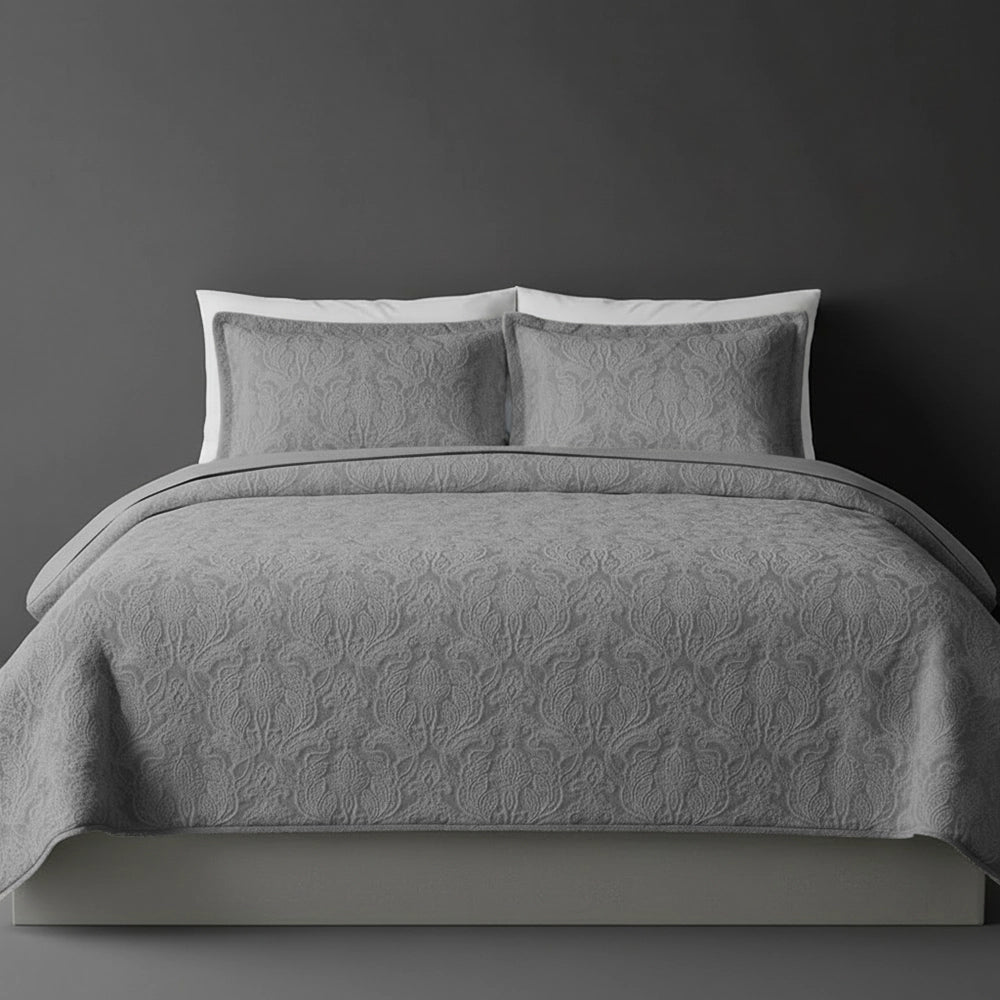 Grey Kensington bedspread on bed by Linen and Co - luxury hospitality bedspread with textured finish