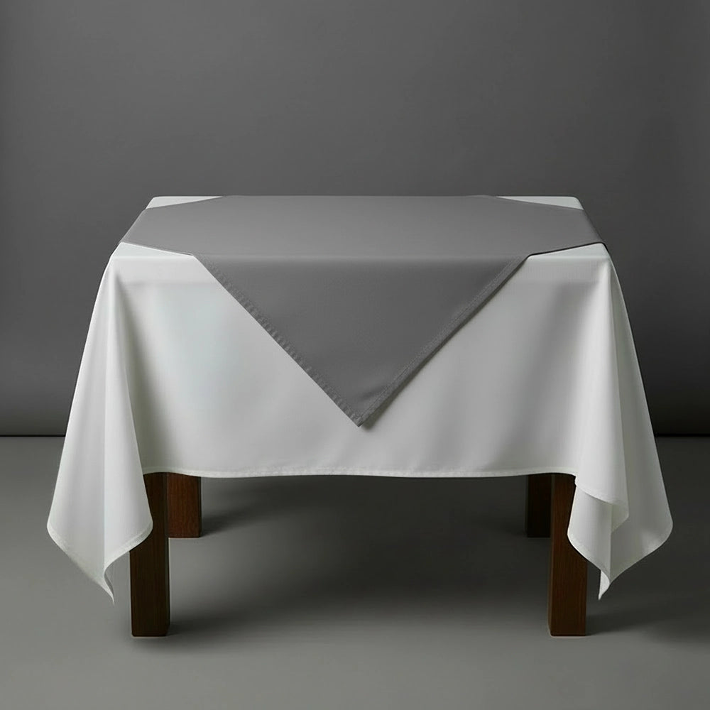 Grey overlay on a white table cloth by Linen and Co - premium hospitality 