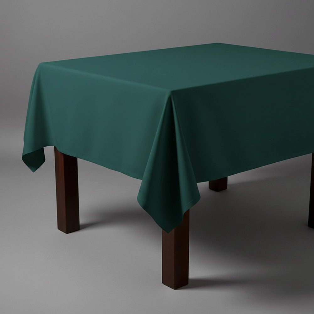 Hunter green square table cloth on wooden table by Linen and Co - premium hospitality table linen