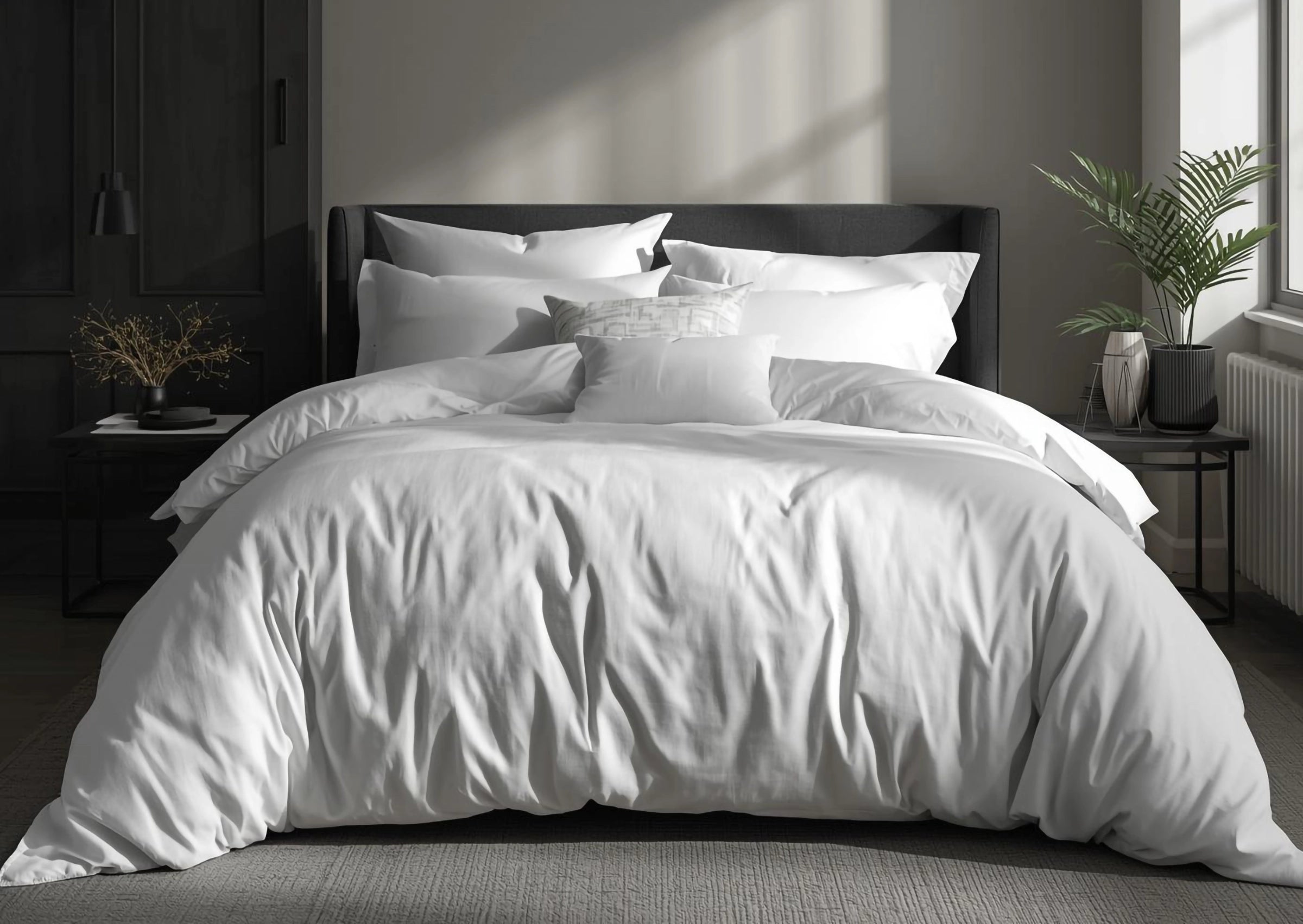 White Percale bed linen collection by Linen and Co, styled on a modern bed with crisp white duvet cover and pillowcases for hospitality and home.