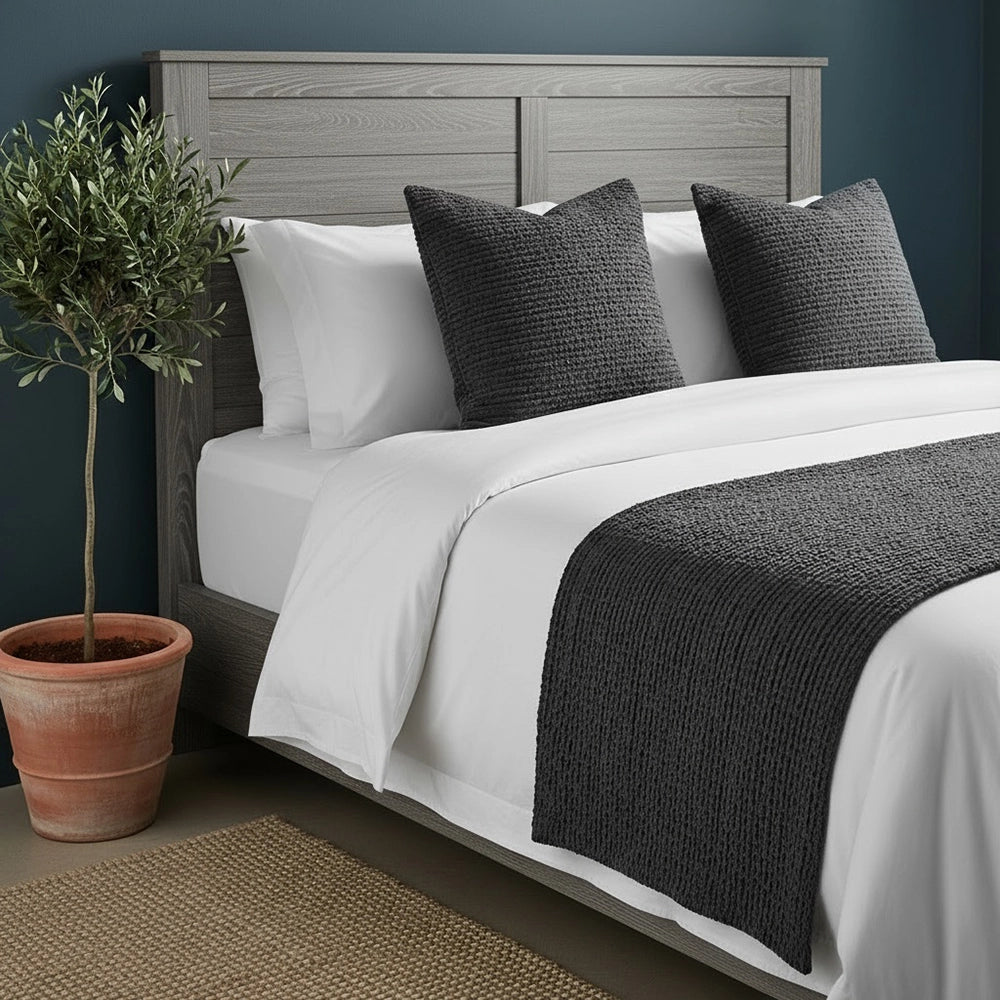 Linen & Co white cotton percale duvet cover with charcoal grey Oxford pillowcases and quilted bed runner in modern bedroom setting with minimalist luxury styling
