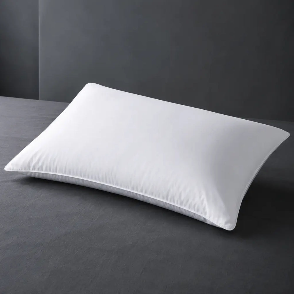Luxury Microfibre Pillow inner on a cool charcoal surface