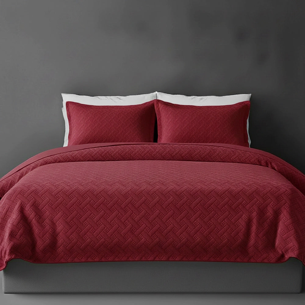 Maroon Italian Velvet bedspread on bed by Linen and Co - luxury hospitality bedspread with textured 