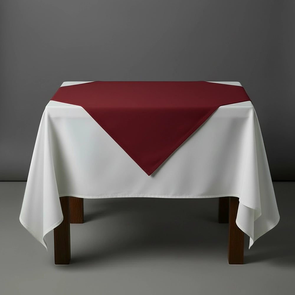 Maroon overlay on a white table cloth by Linen and Co - premium hospitality 