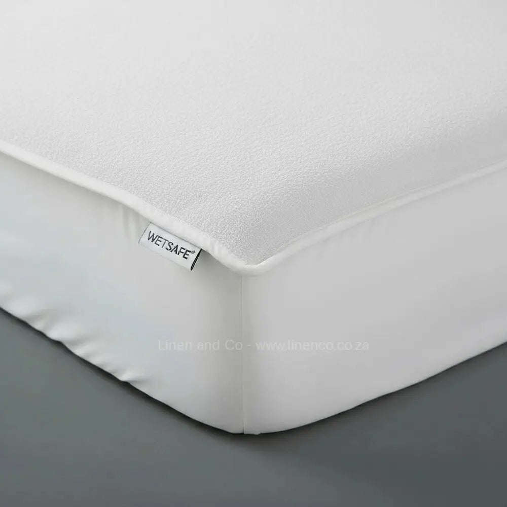 White towelling Wetsafe mattress protector with terry texture and waterproof protection - Linen and Co