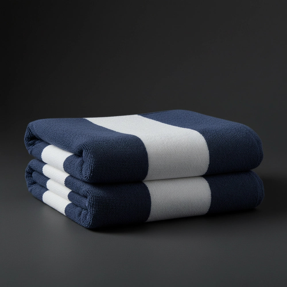 Navy and white broad stripe pool towels stacked - premium hospitality pool linen by Linen and Co