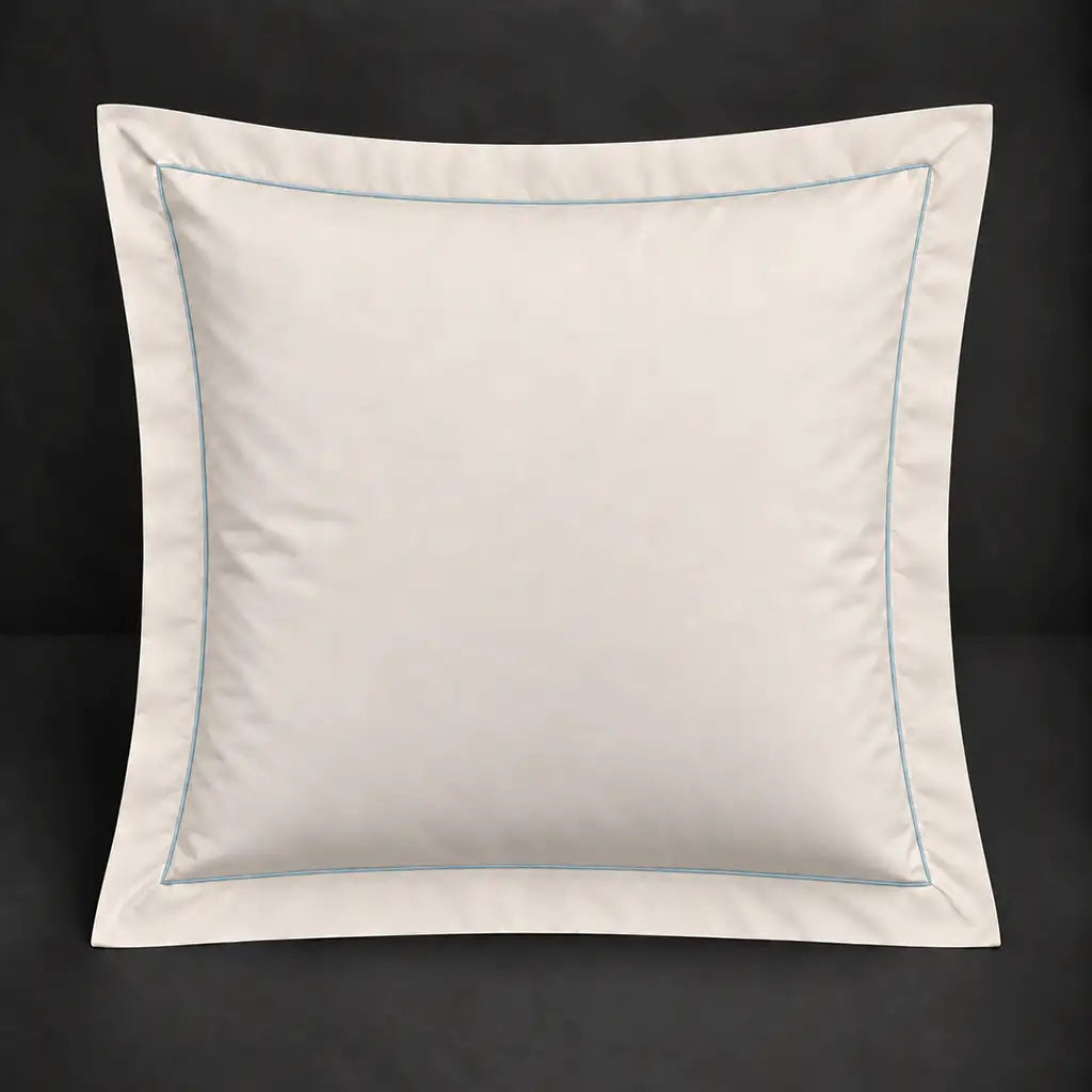 Cream Oxford 200TC cotton percale continental pillowcase with one row duck egg satin stitch border by Linen and Co