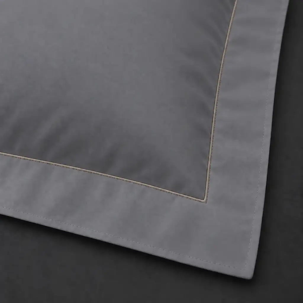 Close-up of grey Oxford pillowcase with one row grey satin stitch border by Linen and Co