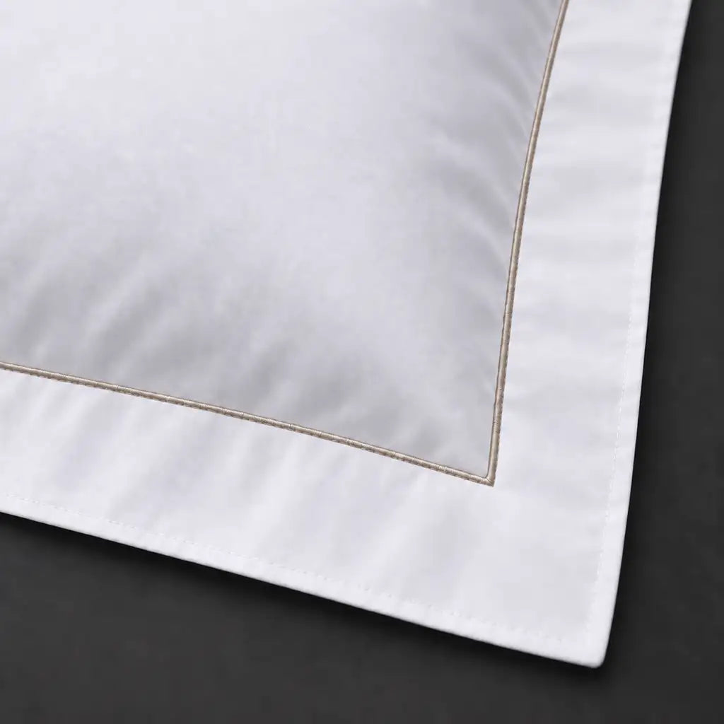 Close-up of white Oxford pillowcase with one row stone satin stitch border by Linen and Co