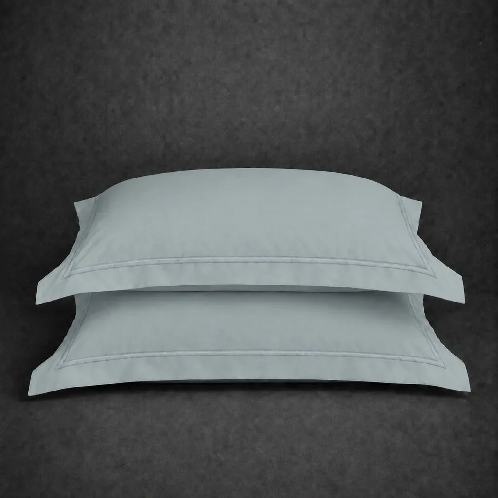 Duck Egg polycotton percale 200TC Oxford pillow case, Standard and King, duck egg two row satin stitch — stacked pair view.