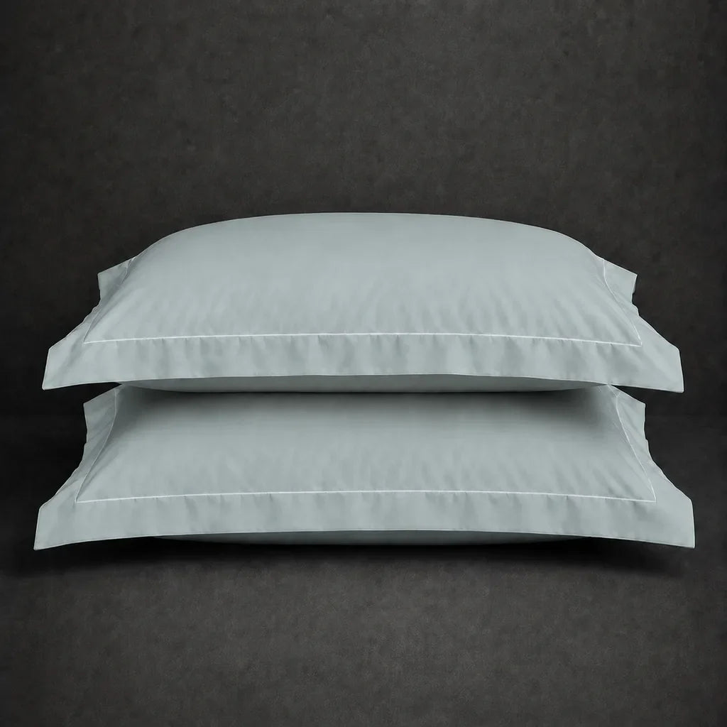 Duck Egg polycotton percale 200TC Oxford pillow case, Standard and King, white one row satin stitch — stacked pair view.