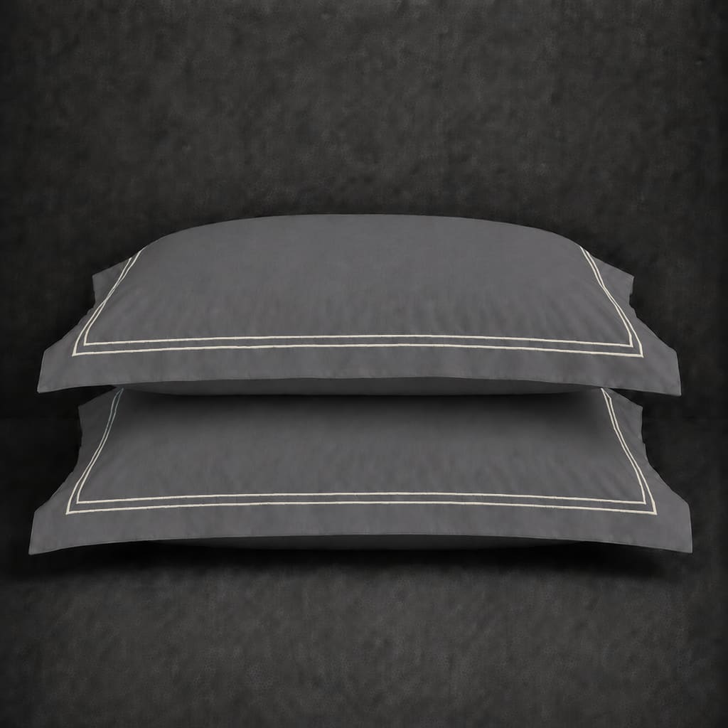 Grey polycotton percale 200TC Oxford pillow case, Standard and King, Natural Cream two row satin stitch — stacked pair view.