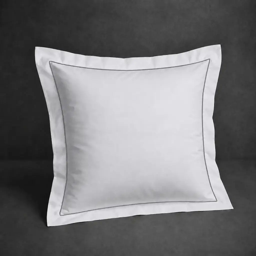 White polycotton percale 200TC Oxford pillow case, Continental, grey one-row satin stitch — front view.