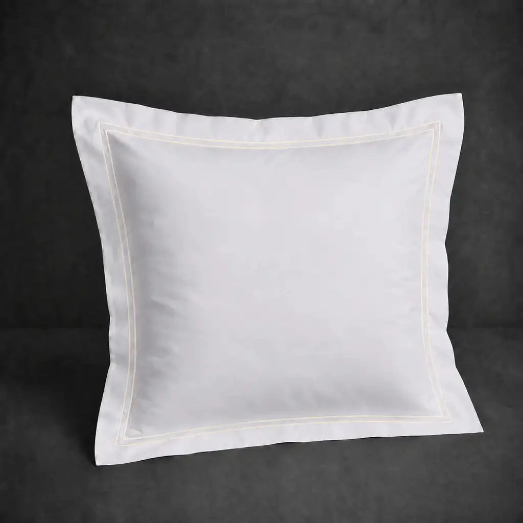 White polycotton percale 200TC Oxford pillow case, Continental, natural cream two-row satin stitch — front view.