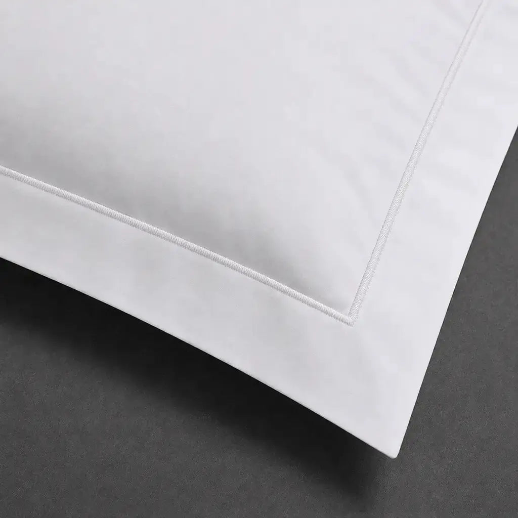 White polycotton percale 200TC Oxford pillow case, Standard and King, white one-row satin stitch — close-up detail.