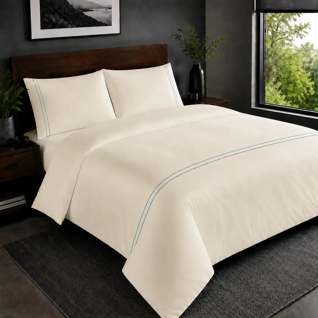 Cream 200TC plain duvet cover with Duck Egg two row satin stitch - hero - Linen and Co