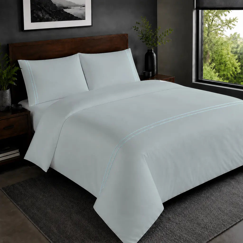 Duck Egg Polycotton Percale 200TC duvet cover set with Duck Egg two-row satin stitch in the hero bedroom view.