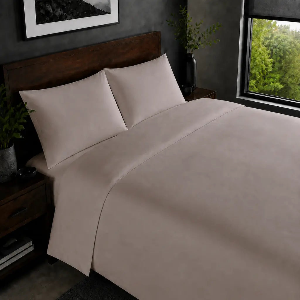 Stone 200TC plain duvet cover with no satin stitch - on the bed - Linen and Co