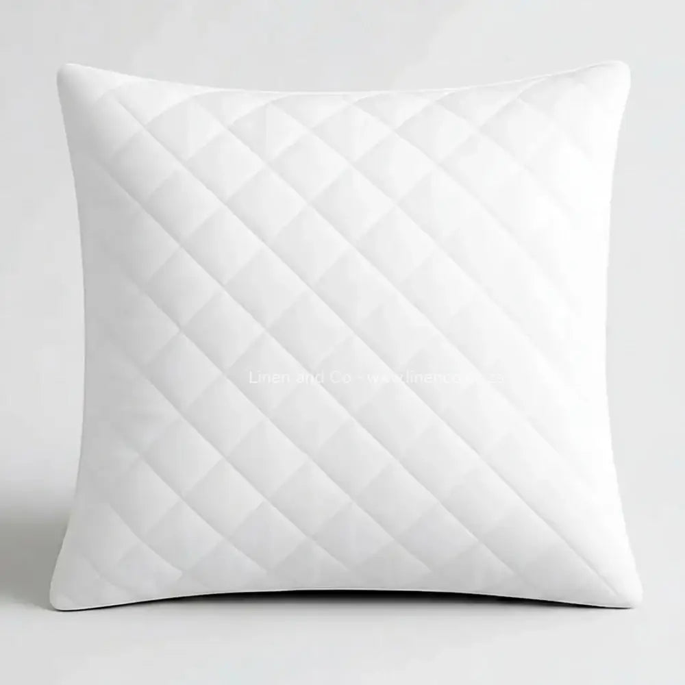 Quilted Wetsafe Pillow Protector in Continental size (80x80cm) – white quilted waterproof pillow cover with diamond quilting pattern, displayed on neutral background. Hospitality-grade, machine washable pillow protection by Linen & Co