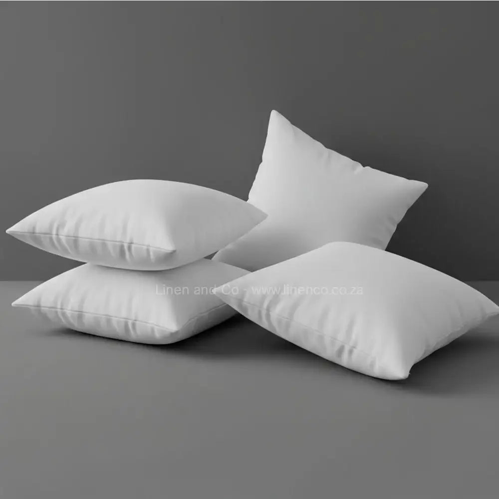 White luxury microfibre pillow from Linen and Co luxury hospitality collection, professional product photography showcasing premium pillow quality and comfort.