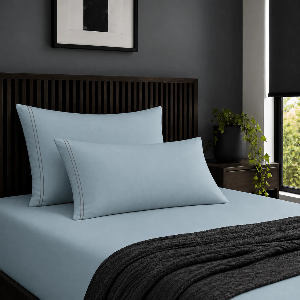 Plain duck egg 200TC 100% cotton percale pillowcases with two row grey satin stitch border by Linen and Co