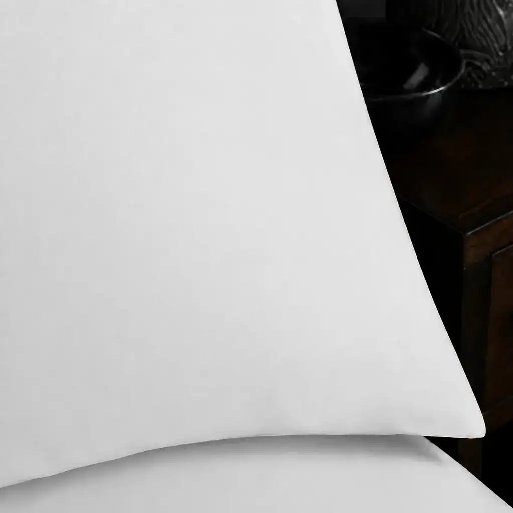 Close-up of white pillowcase with no satin stitch border by Linen and Co