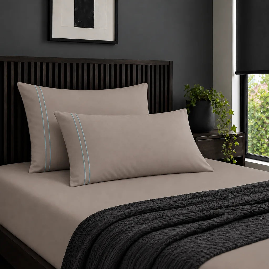 Plain stone 200TC 100% cotton percale pillowcases with two row duck egg satin stitch border by Linen and Co