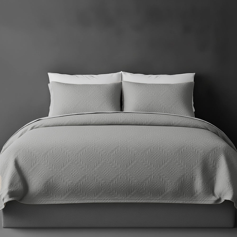 Platinum Grey Istanbul bedspread on bed by Linen and Co - luxury hospitality bedspread with textured finish