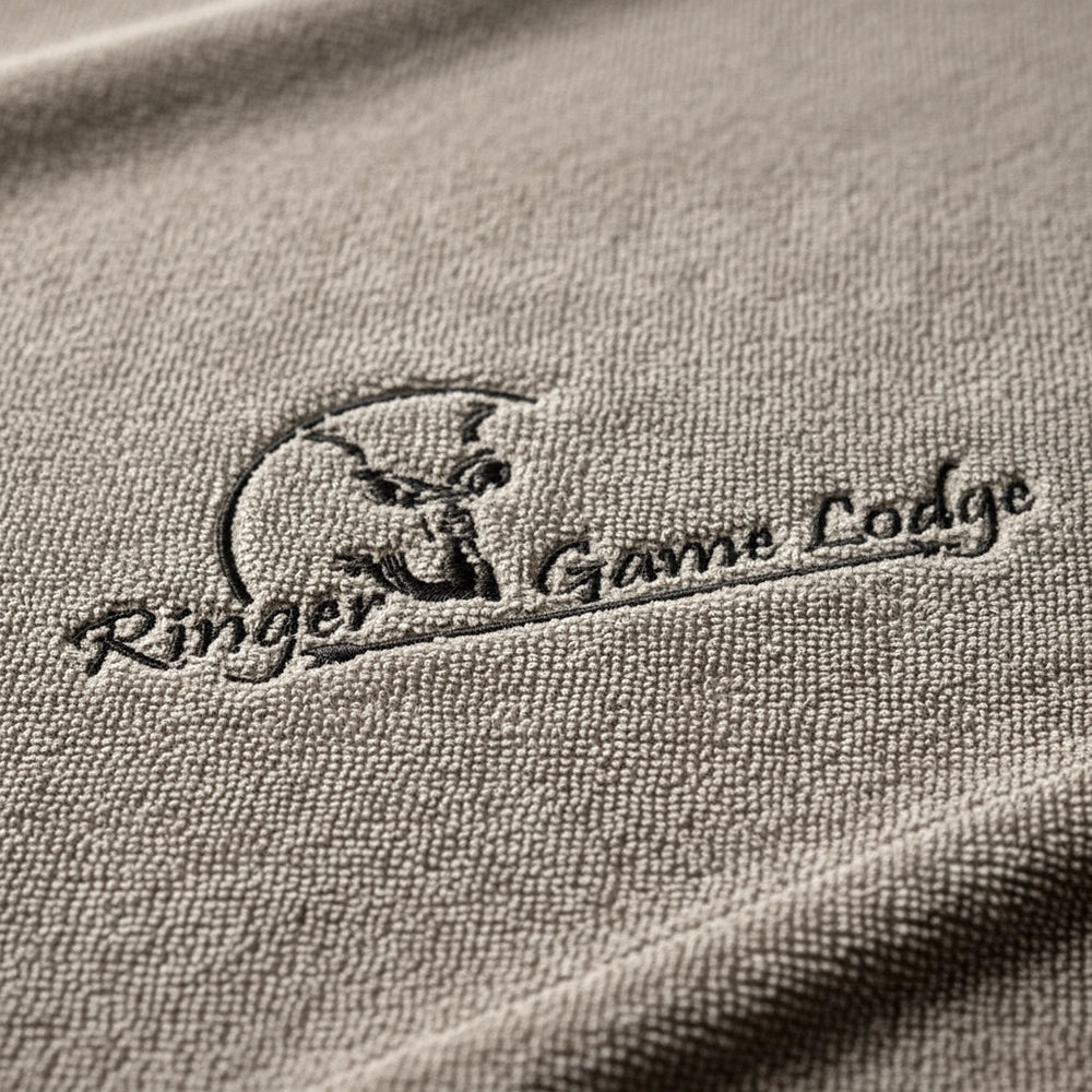 Custom embroidered logo on  stone towelling by Linen and Co - premium hospitality towel branding detail